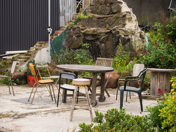 Outdoor table and chairs in amongst ruins