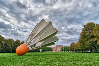 Built structure on field in park against sky