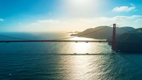 Bridge over sea against sky