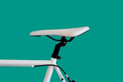 Low angle view of bicycle against white background