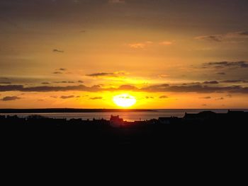 Scenic view of silhouette landscape against sky during sunset