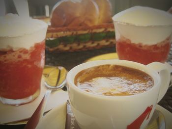 Close-up of coffee served on table