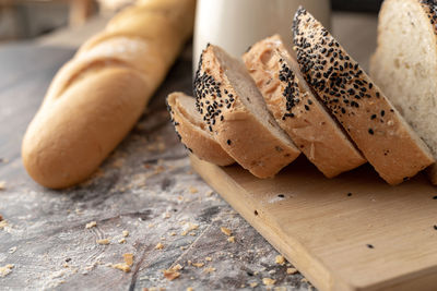 High angle view of bread on cutting board