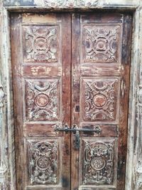 Close-up of closed wooden door of building