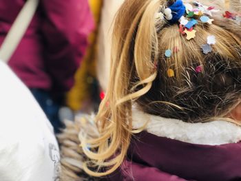 Rear view of teenage girl with confetti on hair