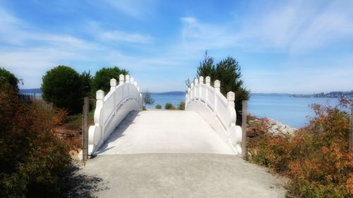 Footpath leading to calm sea