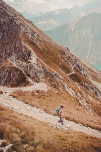 Full length of man hiking on mountain