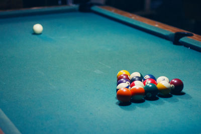 Close-up of multi colored balls on table