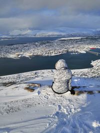 Scenic view of snowcapped landscape against sky during winter