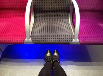 Low section of woman standing on floor