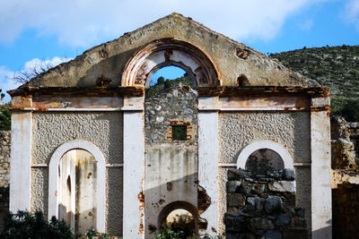 Low angle view of old building against sky