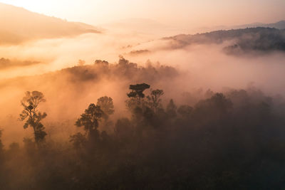 Scenic view of mountains against sky during sunset