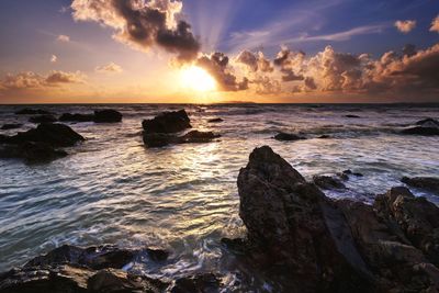 Scenic view of sea against sky during sunset