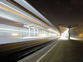 Railroad station platform at night