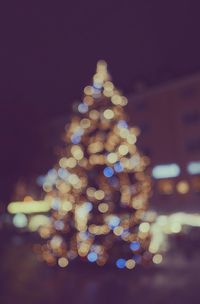 Close-up of illuminated christmas tree at night