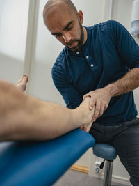 Patient in physiotherapist office