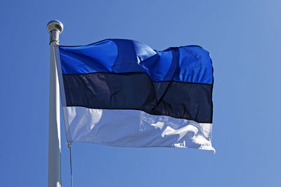 Estonian flag waving in the summer wind