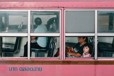 Men on window