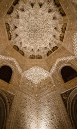 Low angle view of ornate ceiling of building