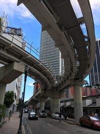 Low angle view of bridge in city