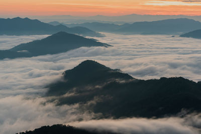 Scenic view of mountains against sky during sunset