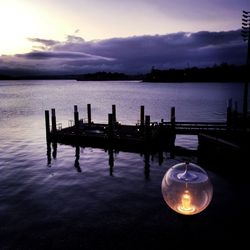 Scenic view of lake at sunset