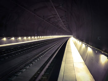 Illuminated railroad station platform