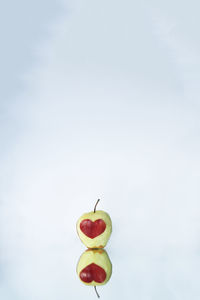 Apple with peel in shape of heart