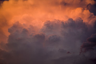 Low angle view of dramatic sky during sunset