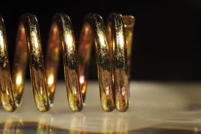 Close-up of glasses against black background