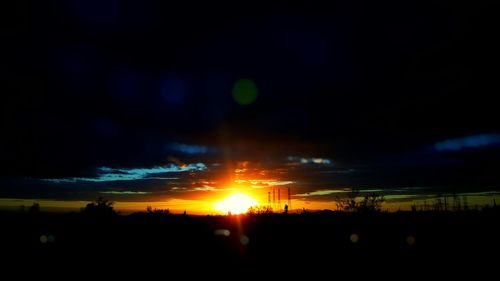 Scenic view of landscape at sunset