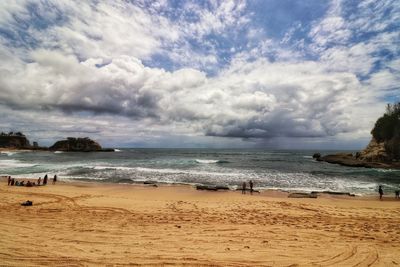 Scenic view of beach against sky