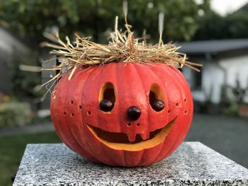 Close-up of pumpkin on red halloween