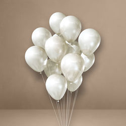Close-up of balloons against white background
