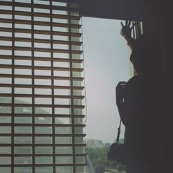 Woman standing in front of building