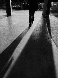 Low section of man standing on floor