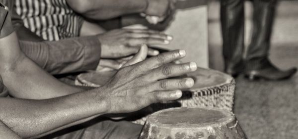 Close-up of man playing piano