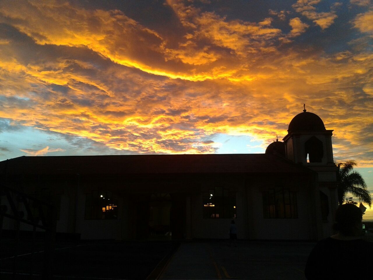 architecture, sky, built structure, sunset, building exterior, cloud - sky, cloudy, silhouette, cloud, dramatic sky, orange color, house, dusk, low angle view, weather, church, beauty in nature, nature, outdoors, religion