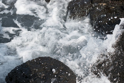 Water splashing on rocks