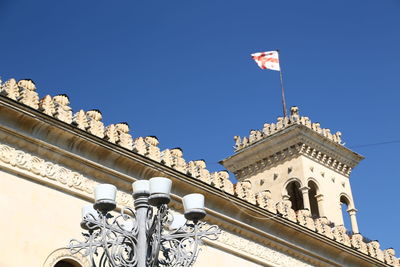 Low angle view of building against blue sky