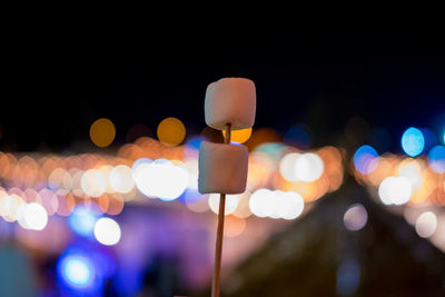 Marshmallows in stick at pingfai festival during night