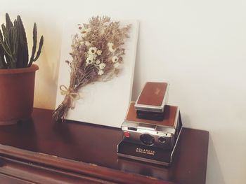 Close-up of camera on table