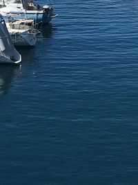 Boats moored in sea