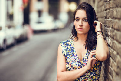 Portrait of beautiful woman standing outdoors