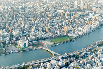 High angle view of bridge and buildings in city