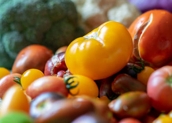 Close-up of fruits on tomatoes