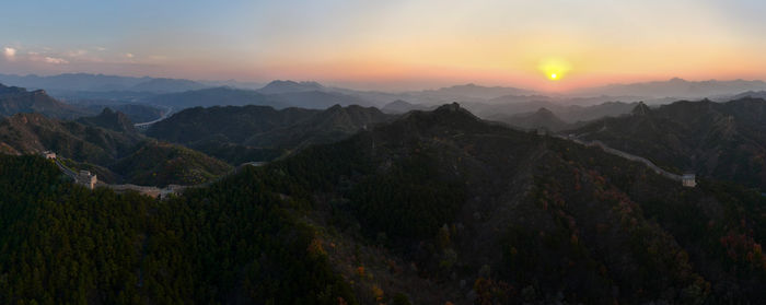 Panoramic view of mountains against sky during sunset