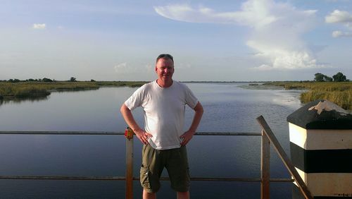 Portrait of a young man standing in water