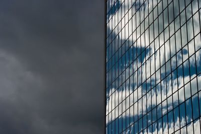 Low angle view of modern building against sky