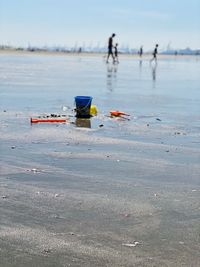 Nautical vessel on sea shore against sky